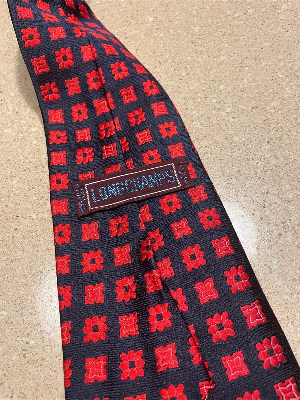 Longchamps Navy Tie with Red Floral-Geometric Pattern
